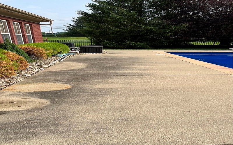 Dirty pool deck before power washing