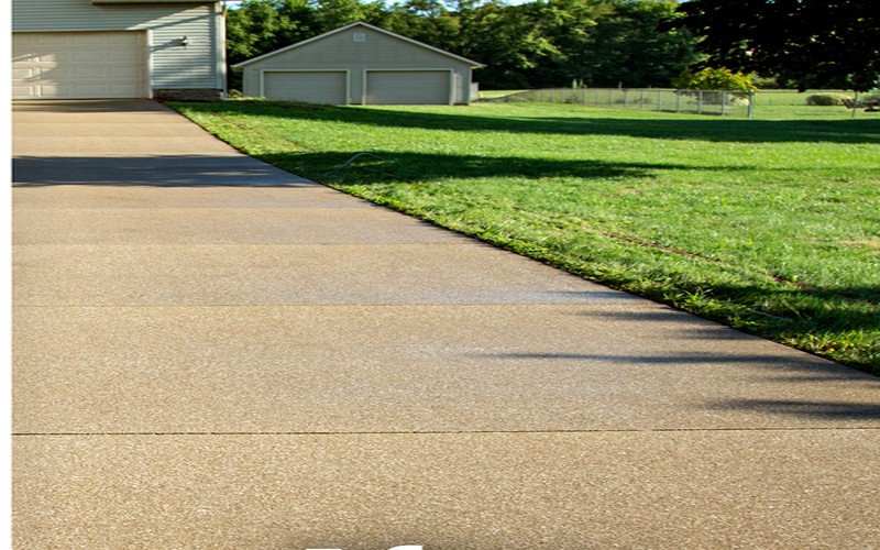 Clean driveway after power washing