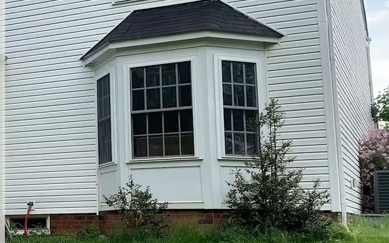 Clean siding after power washing